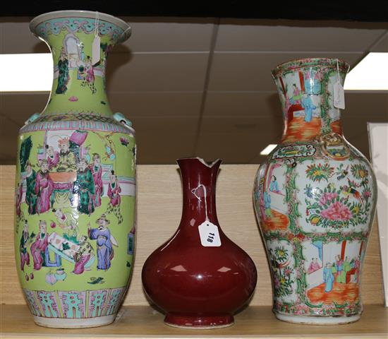 Two large 19th century Chinese famille rose vases and a sang-de-boeuf vase, H 32-58cm (3, all damaged)